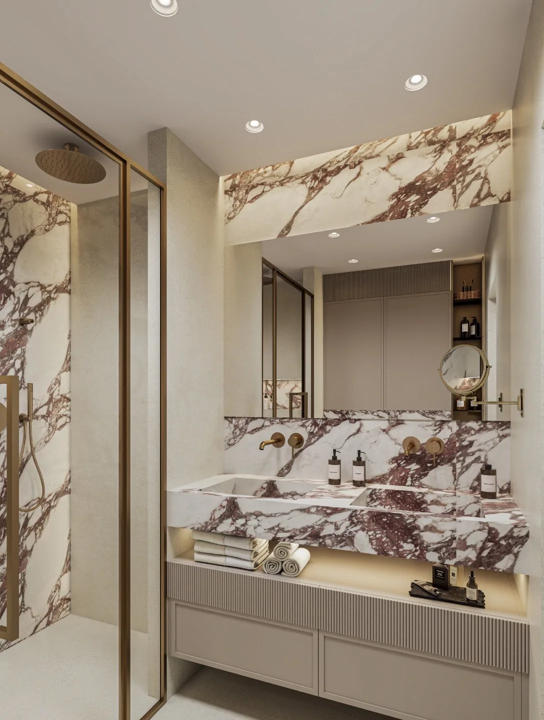 Marble vanity with dual sinks, brass fixtures, and walk-in shower in a custom home master bath.