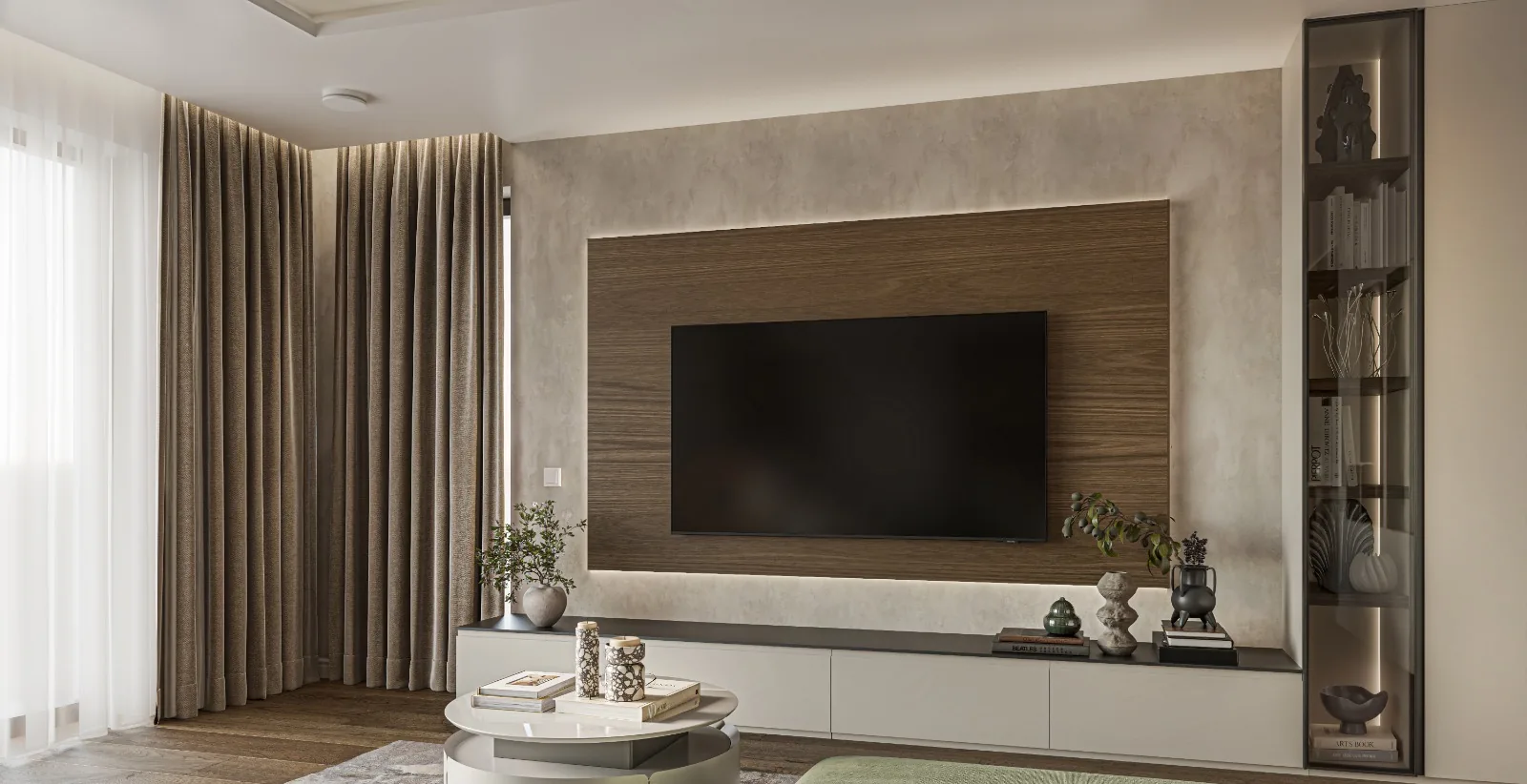 Wall-mounted TV, custom cabinetry, and floor-to-ceiling curtains.