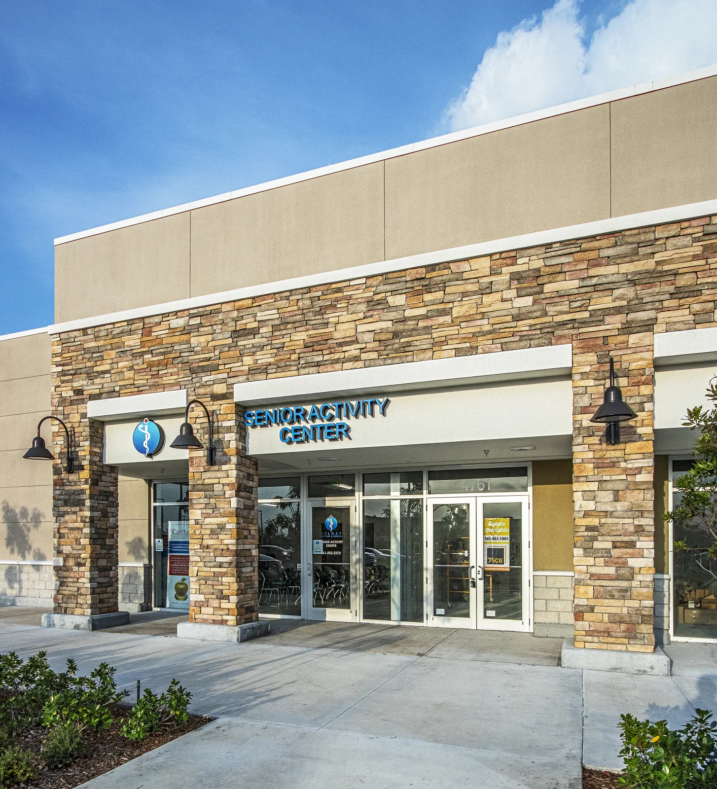 Senior Activity Center storefront with stone and stucco exterior.